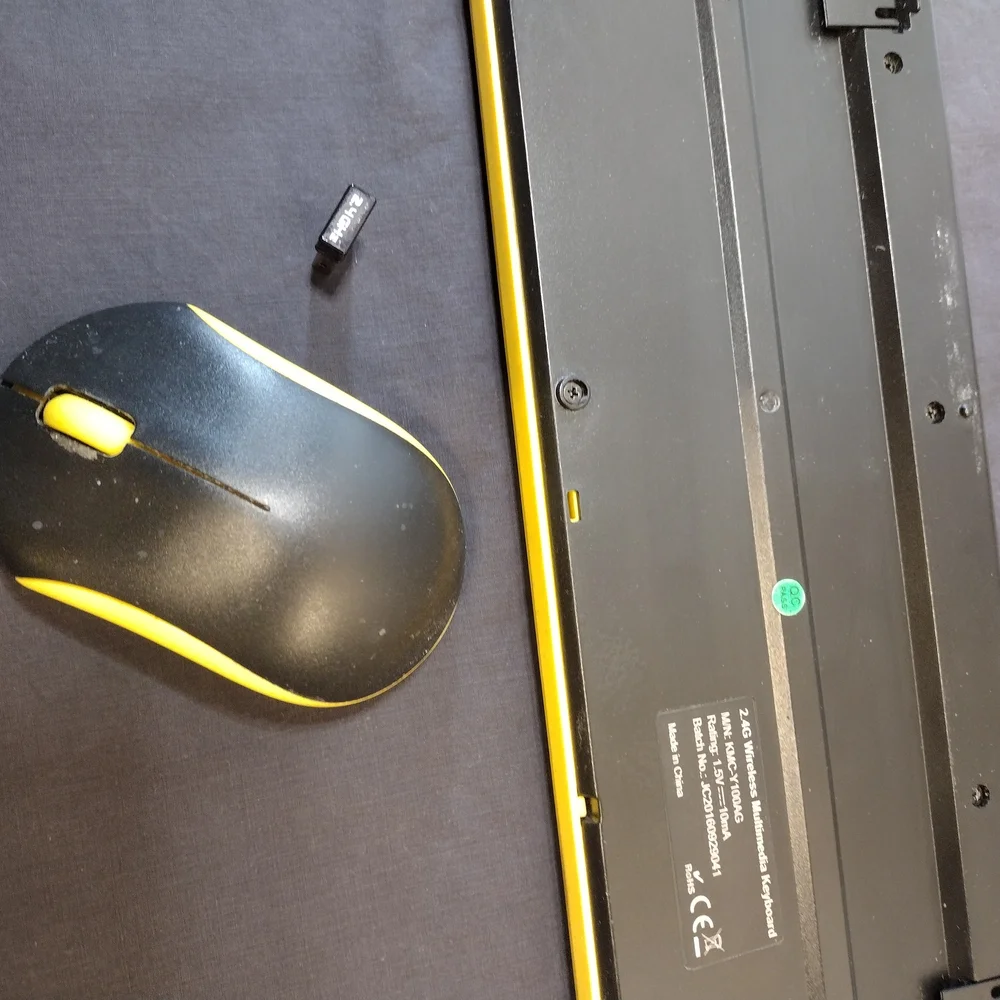 Logitech Black and Yellow Wireless Keyboard and Mouse Combo